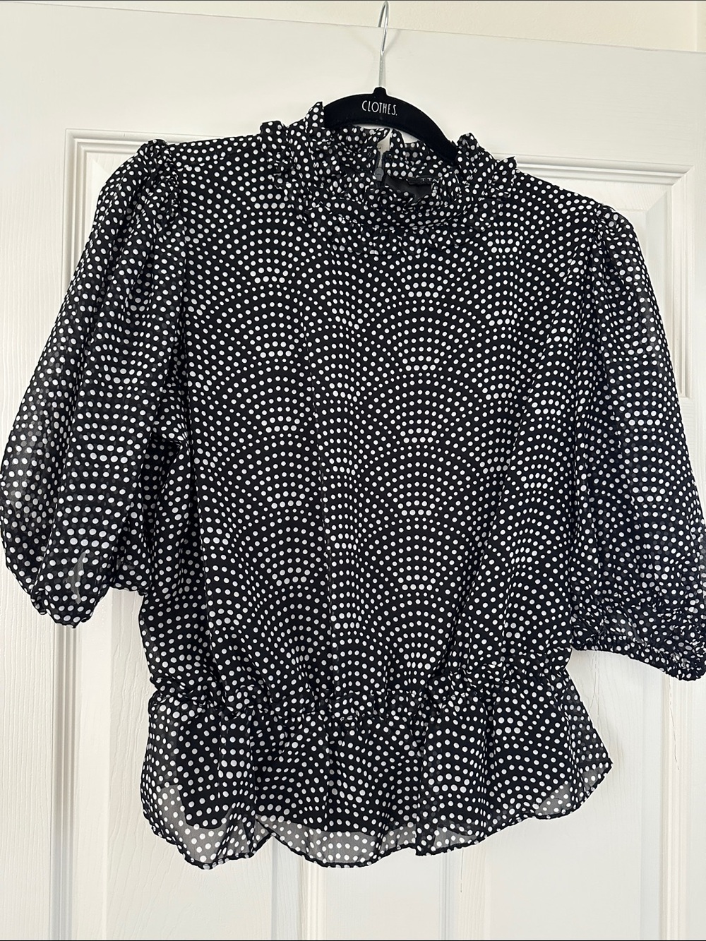 Black and white polka dot blouse